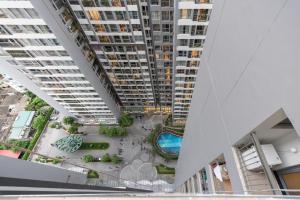 an overhead view of a building with a pool at Park Hill No1 Apartment in Hanoi