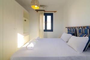 Posteľ alebo postele v izbe v ubytovaní Okirroi Villas Chersonissos