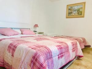 Postel nebo postele na pokoji v ubytování B&B Red Village