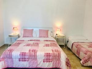 Postel nebo postele na pokoji v ubytování B&B Red Village