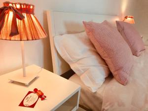 Postel nebo postele na pokoji v ubytování B&B Red Village