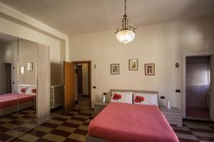 A bed or beds in a room at Albergo Sala