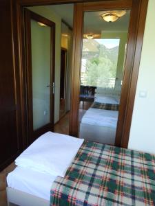Postel nebo postele na pokoji v ubytování Hotel Pelikan