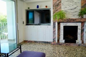 TV a/nebo společenská místnost v ubytování Voramar on Pinewalk