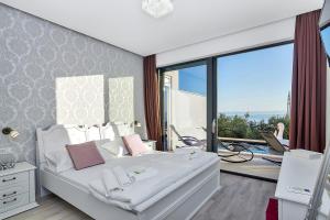 Posteľ alebo postele v izbe v ubytovaní Holiday home Anja + 37 fotografií