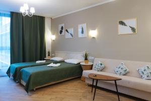 Кровать или кровати в номере Ecoliner Hotel