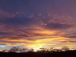 The sunrise or sunset as seen from the holiday home or nearby