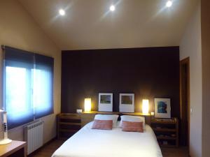 A bed or beds in a room at Villa Bosque Albite