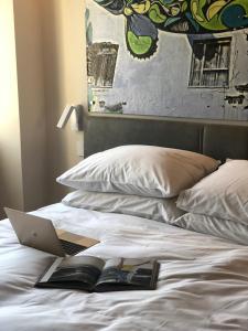Letto o letti in una camera di Link Hotel & Hub By Dan Hotels