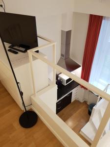 Televiisor ja/või meelelahutuskeskus majutusasutuses Connection Guesthouse
