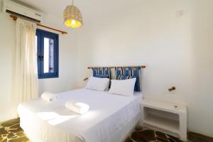Posteľ alebo postele v izbe v ubytovaní Okirroi Villas Chersonissos