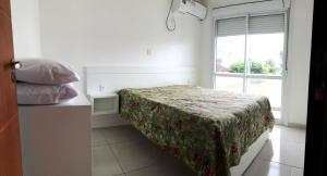 Postel nebo postele na pokoji v ubytování Residencial Bela Morada
