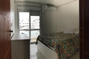Postel nebo postele na pokoji v ubytování Residencial Bela Morada