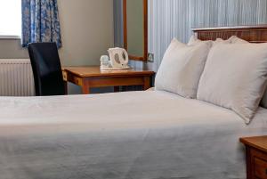 Postel nebo postele na pokoji v ubytování Best Western Thurrock Hotel