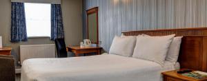 Postel nebo postele na pokoji v ubytování Best Western Thurrock Hotel