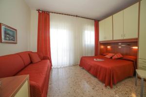 A bed or beds in a room at Residence Sabrina