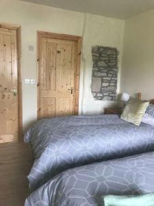 Katil atau katil-katil dalam bilik di Ash Lodge Leitrim Village
