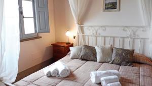 Letto o letti in una camera di Borgo in Chianni