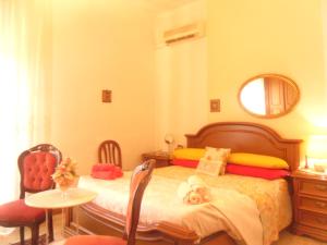 Postel nebo postele na pokoji v ubytování Amabile Guesthouse