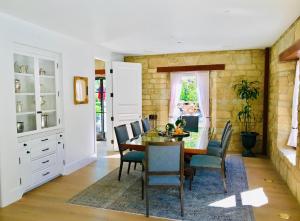 a dining room with a table and chairs at The Francis House in Calistoga