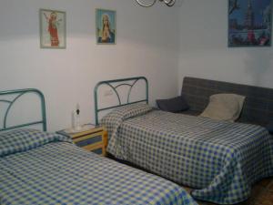 Postel nebo postele na pokoji v ubytování Casas Cueva Paloma