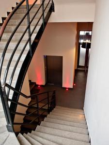 a staircase leading up to a stair case at Hotel PurPur in Prague