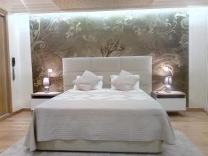 Postel nebo postele na pokoji v ubytování Hotel Rural Rocha da Gralheira