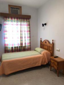 Katil atau katil-katil dalam bilik di Hostal Arias