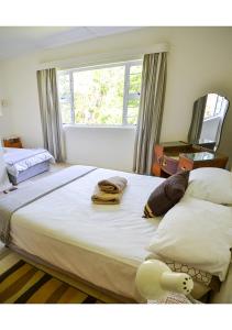 Кровать или кровати в номере Sundaze Riverside House - Colchester - 5km from Elephant Park