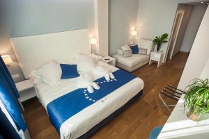 Postel nebo postele na pokoji v ubytování Hotel Boutique Barra Alta (Adults Only)