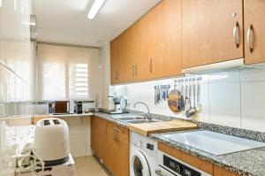 Kuchyňa alebo kuchynka v ubytovaní Apartamento "El Lilà 2" - Parking incluido