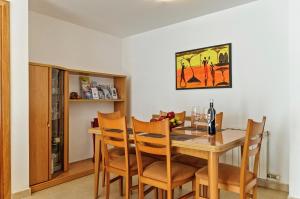 Televízia a/alebo spoločenská miestnosť v ubytovaní Apartamento "El Lilà 2" - Parking incluido