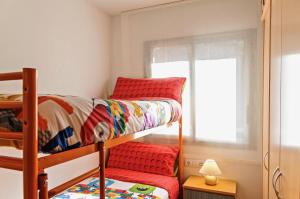 Posteľ alebo postele v izbe v ubytovaní Apartamento "El Lilà 2" - Parking incluido