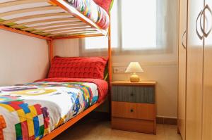 Posteľ alebo postele v izbe v ubytovaní Apartamento "El Lilà 2" - Parking incluido