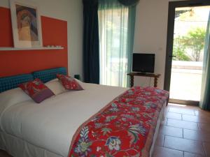 Postel nebo postele na pokoji v ubytování Le relais d'Angélique