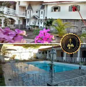 um resort com piscina e um hotel em Pousada do Mendonça em Juiz de Fora