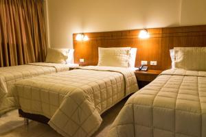 Katil atau katil-katil dalam bilik di Hotel Hohenau