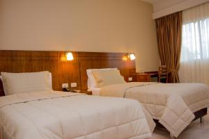Postel nebo postele na pokoji v ubytování Hotel Hohenau + 37 fotografií