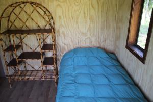 Krevet ili kreveti u jedinici u objektu Cabañas Cerro Colorado Lago Colbún