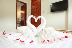 Katil atau katil-katil dalam bilik di Hồng Tùng Hotel