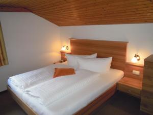 Postel nebo postele na pokoji v ubytování Ferienhaus Höchhäusl