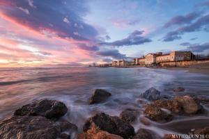 a view of a beach with rocks in the water at B&B Il Cuore in Massa