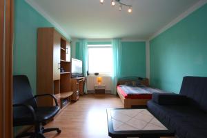 Zona de estar de ProFair Private Apartments & Rooms near Messe - room agency