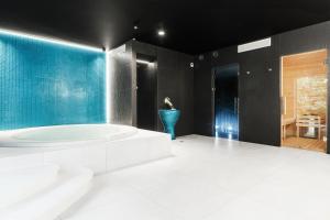 Postel nebo postele na pokoji v ubytování Hotel Testa