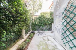 Vonkajšia záhrada v ubytovaní Torre dell'Orologio Apartment + 6 fotografií