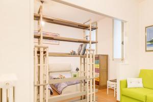 Posteľ alebo postele v izbe v ubytovaní Torre dell'Orologio Apartment