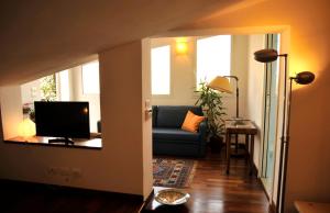 TV a/nebo společenská místnost v ubytování B&B Fiera - Mini attico