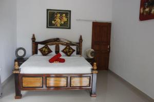 Postel nebo postele na pokoji v ubytování Sekumpul Accommodation
