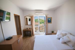 Posteľ alebo postele v izbe v ubytovaní Župa Dubrovačka Guest House + 37 fotografií