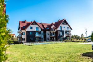 Vonkajšia záhrada v ubytovaní Apartament Przy Klifach